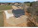 Beautiful two-story home with a concrete driveway and a well-manicured lawn at 115 River Meadow Ln, Social Circle, GA 30025