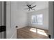 Bright bedroom with a ceiling fan and natural light at 115 River Meadow Ln, Social Circle, GA 30025
