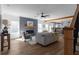 Inviting living room with fireplace, exposed beams, and open layout at 115 River Meadow Ln, Social Circle, GA 30025