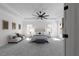 Elegant main bedroom boasts a trey ceiling, a fireplace and neutral colors creating a calming retreat at 115 River Meadow Ln, Social Circle, GA 30025