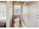 Bathroom with a toilet and a shower with sliding glass doors at 1198 Seminary Dr, Marietta, GA 30064