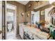 Bathroom featuring wallpaper, vanity with a marble countertop, and a toilet at 1198 Seminary Dr, Marietta, GA 30064