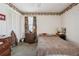 Basic bedroom with carpet, patterned wallpaper border, two windows, and a closet at 1198 Seminary Dr, Marietta, GA 30064