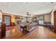Spacious living room with a brick fireplace, hardwood floors, and classic decor at 1198 Seminary Dr, Marietta, GA 30064