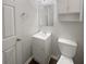 Cozy bathroom with functional sink and toilet at 474 Berckman Nw Dr, Lilburn, GA 30047