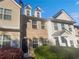 Charming two-story townhouse with brick facade and well-maintained landscaping at 474 Berckman Nw Dr, Lilburn, GA 30047