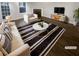 Bright living room features modern decor, fireplace, and stylish furniture at 474 Berckman Nw Dr, Lilburn, GA 30047