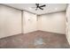 Unfinished basement with utility connections, painted walls, and ceiling fan at 8955 Shalford Ct, Cumming, GA 30041