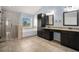 Primary bathroom featuring soaking tub, double sinks, and walk-in shower at 8955 Shalford Ct, Cumming, GA 30041