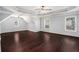 Spacious Primary bedroom with tray ceiling and lots of natural light at 8955 Shalford Ct, Cumming, GA 30041