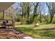 Inviting backyard space with a fire pit and deck, ideal for outdoor enjoyment at 3351 Phillip Cir, Decatur, GA 30032