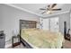 Serene bedroom featuring neutral tones and a rustic wood-style headboard at 3351 Phillip Cir, Decatur, GA 30032