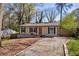Charming single-story home featuring a well-maintained front yard and inviting curb appeal at 3351 Phillip Cir, Decatur, GA 30032