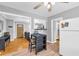 Open concept kitchen with hardwood floors, stainless appliances, and bar seating at 3351 Phillip Cir, Decatur, GA 30032