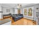 Inviting living room with hardwood floors, comfortable seating, and ample natural light at 3351 Phillip Cir, Decatur, GA 30032