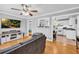 Cozy living room with hardwood floors and a view into the kitchen and dining areas at 3351 Phillip Cir, Decatur, GA 30032