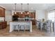 Stylish kitchen with granite countertops, stainless steel appliances, and a breakfast bar at 3391 Meadow Grass Dr, Dacula, GA 30019