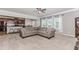 Open-concept living area seamlessly flows into the kitchen and dining spaces, perfect for entertaining at 3391 Meadow Grass Dr, Dacula, GA 30019