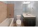 Cozy bathroom showcasing a tub-shower combo and modern vanity with a sleek mirror at 4913 Sydney Ln, Marietta, GA 30066