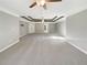Vast bedroom with tray ceilings, broadloom carpeting, and multiple windows at 4913 Sydney Ln, Marietta, GA 30066