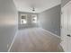Neutral bedroom with carpet floors, ceiling fan, and double windows at 4913 Sydney Ln, Marietta, GA 30066