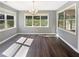 Dining area featuring lots of natural light and hardwood floors at 4913 Sydney Ln, Marietta, GA 30066