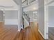 Grand foyer with hardwood floors, staircase, and open entryway at 4913 Sydney Ln, Marietta, GA 30066