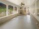 Cozy sunroom with a brick fireplace and lots of natural light at 4913 Sydney Ln, Marietta, GA 30066