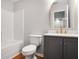 Modern bathroom with stylish vanity, white marble countertops, and a tub-shower combo at 1579 Eastern Sunrise Ln, Decatur, GA 30034