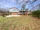 Spacious backyard with a small porch and room for activities at 7648 Mount Zion Blvd, Jonesboro, GA 30236