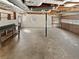 Unfinished basement area with exposed ductwork and concrete floors at 7648 Mount Zion Blvd, Jonesboro, GA 30236