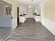 Eat-in kitchen featuring white cabinets, dark countertops, and stainless appliances at 7648 Mount Zion Blvd, Jonesboro, GA 30236