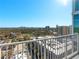 Scenic city view from a balcony, capturing skyline and lush green landscape in bright sunlight at 250 Pharr Ne Rd # 1812, Atlanta, GA 30305