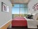 Modern bedroom with large window offering views and natural light at 250 Pharr Ne Rd # 1812, Atlanta, GA 30305