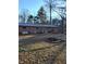 Spacious backyard with patio area, firepit and potential for outdoor enjoyment at 4651 Palm Dr, Douglasville, GA 30135