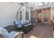 Charming back deck with comfortable seating, perfect for outdoor relaxation and entertaining at 7145 Hartsfield Pl, Suwanee, GA 30024