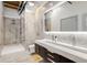 Contemporary bathroom with double vanity, stylish mirrors, and a walk-in shower at 834 Dekalb Ne Ave # D, Atlanta, GA 30307