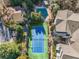 Aerial view of community amenities, including a tennis court and a covered pool at 1250 Parkwood Se Cir # 2309, Atlanta, GA 30339