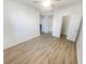 Bright bedroom with light-colored laminate flooring, a ceiling fan, and a walk-in closet at 1250 Parkwood Se Cir # 2309, Atlanta, GA 30339