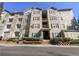 Condo exterior features multiple stories, well-maintained landscaping, and classic architectural details at 1250 Parkwood Se Cir # 2309, Atlanta, GA 30339