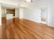 Hardwood floors accentuate the home's open living space, leading to the kitchen area at 1250 Parkwood Se Cir # 2309, Atlanta, GA 30339