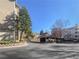 Exterior view of parking area with well-maintained condo buildings in the background at 1250 Parkwood Se Cir # 2309, Atlanta, GA 30339
