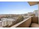 Balcony view overlooking city buildings, trees, and neighborhood scenery on a clear day at 2161 Peachtree Ne Rd # 508, Atlanta, GA 30309
