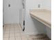 Bright laundry room with side-by-side washer and dryer and built-in folding table at 2161 Peachtree Ne Rd # 508, Atlanta, GA 30309
