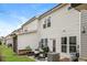 Relaxing patio space with outdoor seating and a lush lawn; great for entertaining at 456 Millsap Way, Marietta, GA 30060