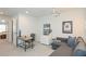 Bright bonus room featuring a desk, sofa, and mounted projector; perfect for entertainment or a home office at 456 Millsap Way, Marietta, GA 30060