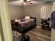 Bedroom with a bed, fan and wood-look floors at 4574 Cedar Ridge Trl, Stone Mountain, GA 30083