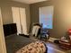 Cozy bedroom featuring a comfortable bed and bright window at 4574 Cedar Ridge Trl, Stone Mountain, GA 30083