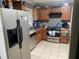 A functional kitchen featuring stainless steel appliances and ample countertop space at 4574 Cedar Ridge Trl, Stone Mountain, GA 30083