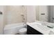 Bathroom features a tub, tiled shower, and dark vanity with white countertop at 514 Eagles Pt, Fairburn, GA 30213